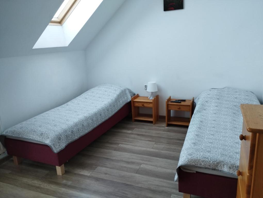 Twin Room with Balcony at Noclegi Pod Dębem