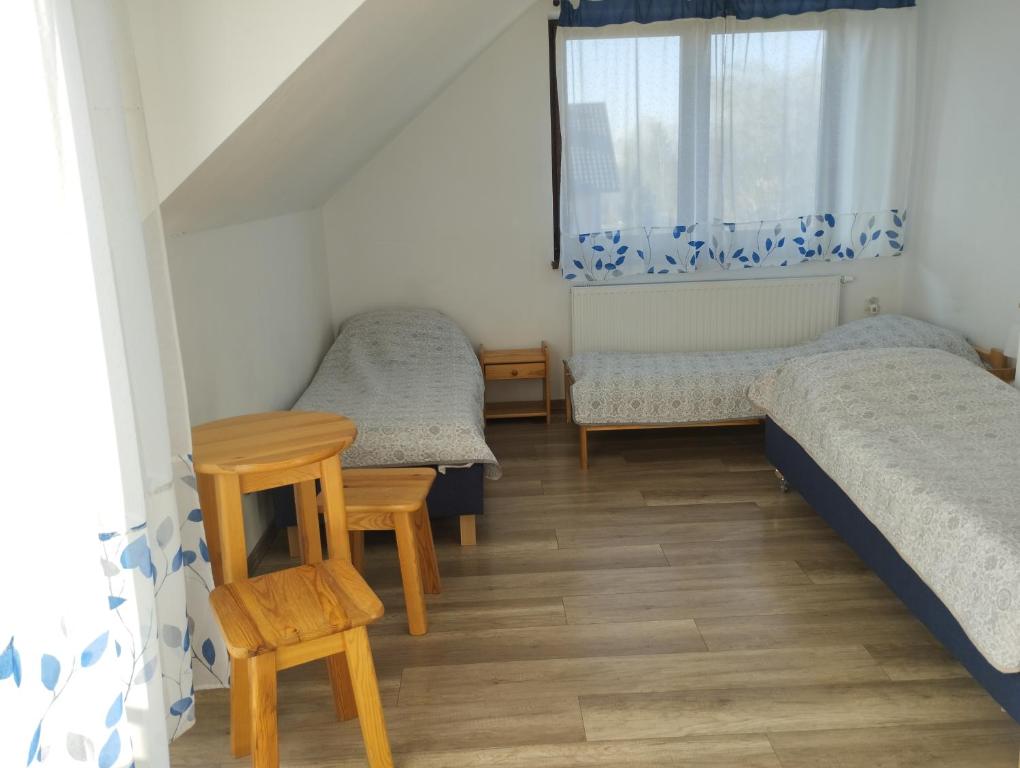 Triple Room with Private Bathroom at Noclegi Pod Dębem